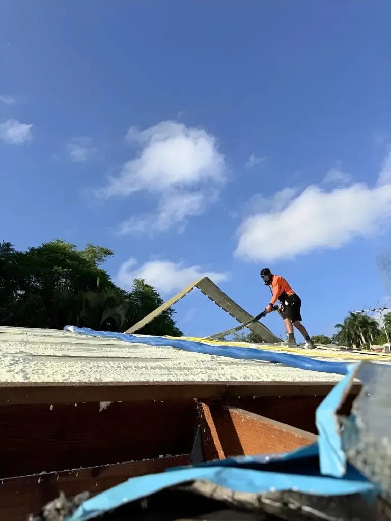 Truefoam installer preparing roof insulation work